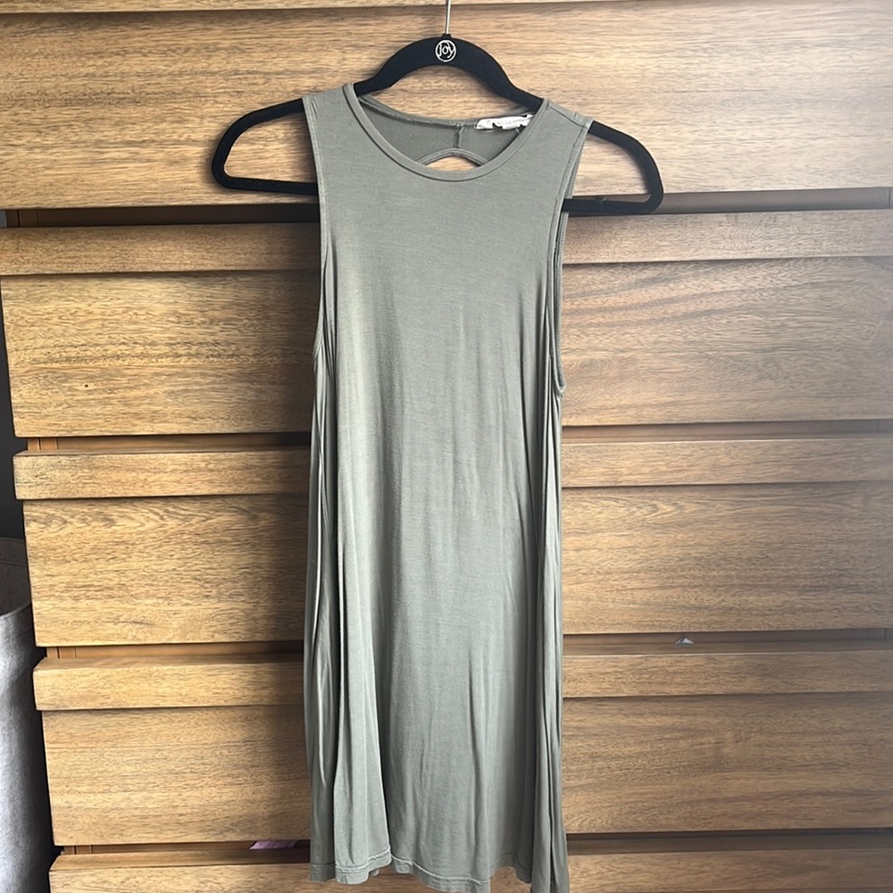 Cut out back, right below the knee dress in green